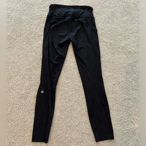 Lululemon Black leggings with pockets size 4. 25 high rise.